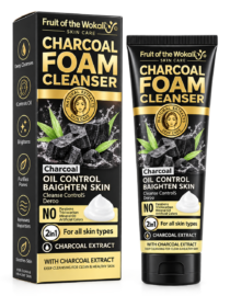 Charcoal Foam Cleanser box and tube from Fruit of the Wokali Skin Care, gold lettering on black, oil-control and brightening skin formula with charcoal extract.