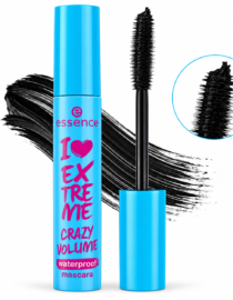 Blue mascara tube reading 'I Love Extreme Crazy Volume' with wand and black mascara stroke behind.