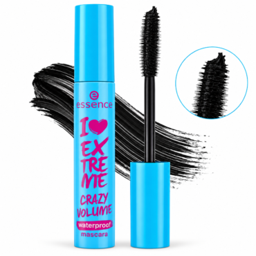 Blue mascara tube reading 'I Love Extreme Crazy Volume' with wand and black mascara stroke behind.
