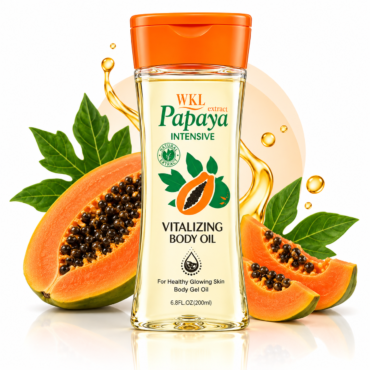 Bottle of Papaya Vitalizing Body Oil with papaya halves and green leaves in a bright studio setting, showcasing the product packaging.