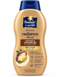 Parachute Radiance Cocoa & Vitamin B5 body lotion bottle, gold with blue cap, showing almond and cocoa imagery on label.