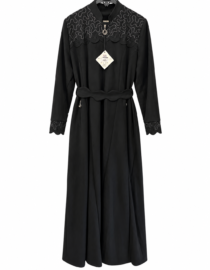 Long black floor length gown with scalloped lace across the yoke and cuffs belt at the waist tag attached on a hanger