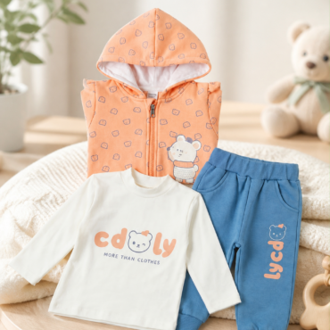 Three-piece baby outfit: peach zip hoodie with small bear print, white long-sleeve shirt with 'cdolly' logo, and blue jogger pants with a bear graphic.
