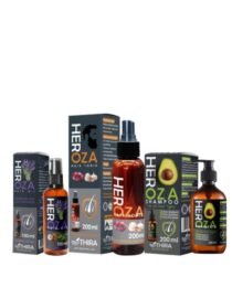 Assorted HerOZA hair care products shampoo tonic oils in dark bottles with labeled boxes displayed together