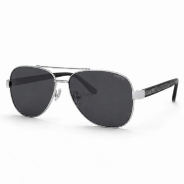 A pair of aviator-style sunglasses with dark lenses and a silver metal frame, Verutti branding on the temple