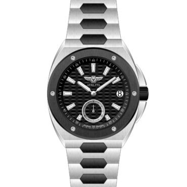 Close-up of a silver metal wristwatch with a black textured dial, white hour markers, and a date window at 3 o'clock.