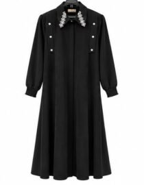 Black long sleeve dress with a pleated A line skirt silver buttons on the bodice and a jeweled collar on a hanger