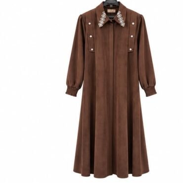 Brown midi dress with long puff sleeves, a decorative studded collar, and double rows of buttons down the front.