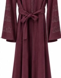 Maroon long robe with a self ties belt and bell sleeves featuring dotted cutout patterns on the sleeves and front placket