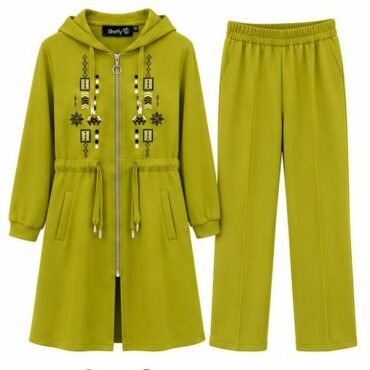 Lime green hooded coat with zipper drawstrings pockets and geometric embroidery paired with matching wide leg pants for kids