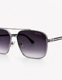 Square leaning aviator sunglasses with a silver metal frame and dark gradient lenses Verutti branding on the lens area
