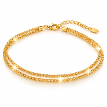 Gold chain bracelet with double twisted links and a lobster clasp, shiny and sparkling on white background.