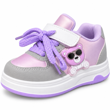 Pink and gray kids sneaker with purple laces and a teddy bear charm on the side set on a white sole with lilac accents