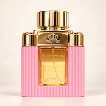 Gold and pink perfume bottle with a tall gold cap; the label reads 'Royal ceremony' by YUMSERA, Eau de Parfum, 100 ml.