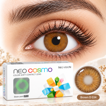 Close-up of a brown eye wearing a brown contact lens with the Neo Cosmo packaging and a separate lens case nearby.