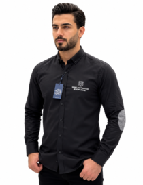 Man wearing a black button up shirt with a club logo and a blue event tag hanging from the neck posing against a white background