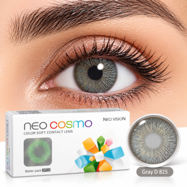 Close-up of an eye with a gray contact lens; Neo Cosmo color soft contact lenses box visible beside a single lens. (Gray D 825)