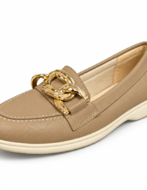 Beige leather loafer with a large gold chain ornament and cream sole
