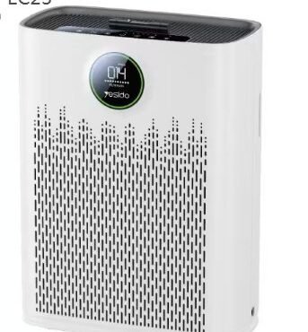 White rectangular air purifier with a perforated front panel and a circular digital display on top front, standing on the floor