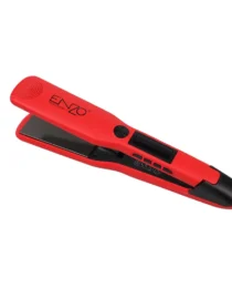Red professional hair straightener with digital display and black plates angled view from the side
